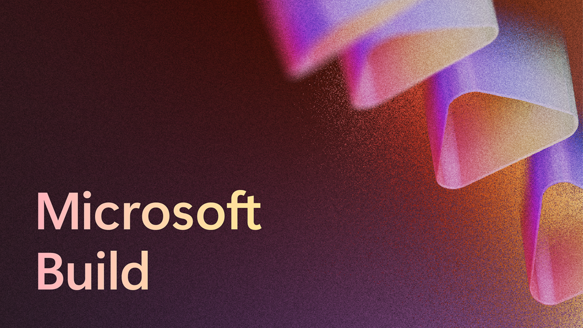 Une image avec Microsoft Build dans le coin inférieur gauche, un fond rouge foncé qui devient pixelisé et plus clair vers le côté droit, et des images de tubes triangulaires sur le côté droit.